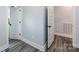 Clean and bright hallway with light gray walls at 423 W Bell St, Statesville, NC 28677