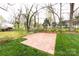 Nice backyard patio with brick pavers and green lawn at 423 W Bell St, Statesville, NC 28677