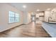 Open concept dining area with hardwood floors and kitchen access at 4445 Dusty Orchard Rd, Kannapolis, NC 28081