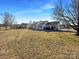 White house exterior with a neat lawn and driveway at 4683 Falcon Chase Sw Dr, Concord, NC 28027