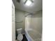 Bathroom featuring a toilet, bathtub, shower and modern fixtures. Neutral color at 5956 Prescott Ct, Charlotte, NC 28269