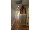 Bright hallway with wood flooring and a staircase leading to the upper level at 5956 Prescott Ct, Charlotte, NC 28269