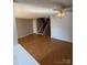 Cozy living room with wood floors, a staircase and neutral paint creating a warm atmosphere at 5956 Prescott Ct, Charlotte, NC 28269