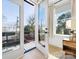 Bedroom with French doors opening to a private balcony at 633 Mattie Rose Ln, Charlotte, NC 28204