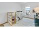 bedroom with play tent, window, and geometric rug at 633 Mattie Rose Ln, Charlotte, NC 28204