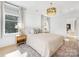 Light and airy bedroom with king bed and access to a private balcony at 633 Mattie Rose Ln, Charlotte, NC 28204