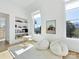 Bright playroom with built-in shelving, beanbag chairs, and a small table and chairs at 633 Mattie Rose Ln, Charlotte, NC 28204