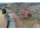 Aerial view of the home's proximity to nearby paved road at 6523 Prospect Rd, Monroe, NC 28112