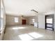 This living room features a brick fireplace and several windows at 6523 Prospect Rd, Monroe, NC 28112