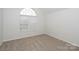 Bedroom with carpeted floor and arched window at 675 Winding Branch Rd, Rock Hill, SC 29732