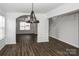 Dining room with hardwood floors and elegant chandelier at 675 Winding Branch Rd, Rock Hill, SC 29732