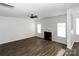 Living room with hardwood floors, fireplace, and ceiling fan at 675 Winding Branch Rd, Rock Hill, SC 29732