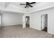 Main bedroom with carpet, ceiling fan and access to other rooms at 675 Winding Branch Rd, Rock Hill, SC 29732