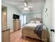 Bright bedroom with neutral decor and wood flooring at 7562 Silver Arrow Dr, Charlotte, NC 28273