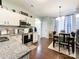 Eat-in kitchen with stainless steel appliances and granite counters at 7562 Silver Arrow Dr, Charlotte, NC 28273