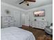 Spacious bedroom with hardwood floors, built-in dresser and comfortable seating at 7672 Nautical Vw, Denver, NC 28037