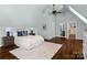 Main bedroom with hardwood floors, vaulted ceiling and ensuite bathroom at 7672 Nautical Vw, Denver, NC 28037