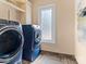 Convenient laundry room with modern appliances and ample storage at 7672 Nautical Vw, Denver, NC 28037