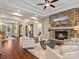 Open living space with a stone fireplace and hardwood floors at 7672 Nautical Vw, Denver, NC 28037