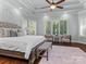 Bright main bedroom with tray ceiling and ample natural light at 7672 Nautical Vw, Denver, NC 28037