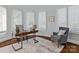 Bright home office with arched windows and hardwood floors at 7672 Nautical Vw, Denver, NC 28037