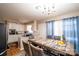 Open concept dining area adjacent to the kitchen at 7716 Elwood Dr, Charlotte, NC 28227