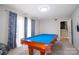 Game room featuring a pool table and ample natural light at 7716 Elwood Dr, Charlotte, NC 28227