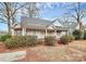 White house with wrap-around porch, needs some TLC at 830 Lowder St, Albemarle, NC 28001