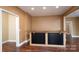 Basement bar with granite countertop and black accents at 8809 Landsdowne Ave, Harrisburg, NC 28075