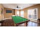 Game room with pool table and plenty of space at 8809 Landsdowne Ave, Harrisburg, NC 28075