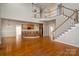 Two story great room with hardwood floors and open floor plan at 8809 Landsdowne Ave, Harrisburg, NC 28075