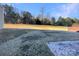 Private backyard with patio and wooded area at 934 Pointe Andrews Dr, Concord, NC 28025