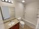 Bathroom features granite vanity and a tub shower combo at 934 Pointe Andrews Dr, Concord, NC 28025