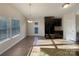 Kitchen features dark cabinetry and granite countertops at 934 Pointe Andrews Dr, Concord, NC 28025