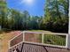 Expansive backyard with lush trees, ready for landscaping and outdoor enjoyment at 108 Vance Allen Ave, Rockwell, NC 28138