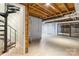 Unfinished basement with high ceilings and sliding glass doors at 108 Vance Allen Ave, Rockwell, NC 28138