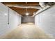 Unfinished basement with exposed ceiling and walls at 108 Vance Allen Ave, Rockwell, NC 28138