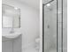 Updated bathroom with gray vanity, frameless shower, and marble tile at 108 Vance Allen Ave, Rockwell, NC 28138