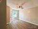 Bedroom featuring vinyl floors, ceiling fan, window, and neutral colors at 108 Vance Allen Ave, Rockwell, NC 28138