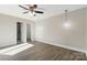 Bright and spacious bedroom with hardwood floors and ceiling fan at 108 Vance Allen Ave, Rockwell, NC 28138