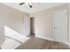 Spacious bedroom with wood-look floors and neutral walls at 108 Vance Allen Ave, Rockwell, NC 28138