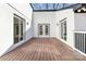 Large deck with double doors and sliding glass doors at 108 Vance Allen Ave, Rockwell, NC 28138