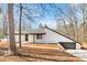 Modern white brick ranch home with a dark gray roof and walkway at 108 Vance Allen Ave, Rockwell, NC 28138
