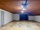 Garage featuring painted brick walls, door to the exterior and plenty of space for parking or storage at 108 Vance Allen Ave, Rockwell, NC 28138