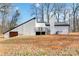 Modern house exterior with a deck and attached garage at 108 Vance Allen Ave, Rockwell, NC 28138