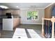 Bright eat-in kitchen with stainless steel appliances and lots of light, perfect for modern living and entertaining at 108 Vance Allen Ave, Rockwell, NC 28138
