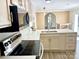 Beautiful kitchen boasts stainless steel appliances, modern countertops, and an open layout perfect for entertaining at 108 Vance Allen Ave, Rockwell, NC 28138