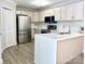 A spacious eat-in kitchen features stainless steel appliances, a large sink, and an open layout with updated countertops at 108 Vance Allen Ave, Rockwell, NC 28138