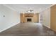 Spacious living room with a brick fireplace and hardwood floors at 108 Vance Allen Ave, Rockwell, NC 28138