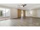 Bright living room with hardwood floors and sliding glass doors to patio at 108 Vance Allen Ave, Rockwell, NC 28138